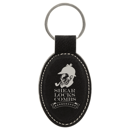 Black/Silver 3" x 1 3/4" Laserable Leatherette Oval Keychain